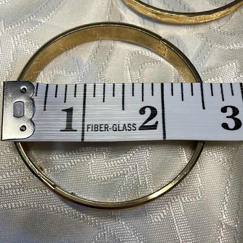 Two gold tone bracelets: one is vintage hinged & other is Monet faceted bangle - Picture 8 of 13